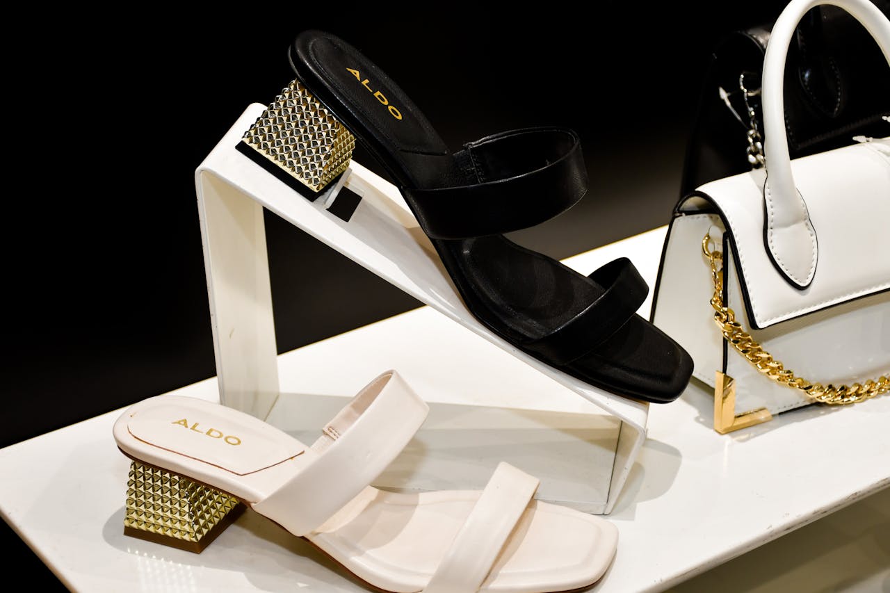 Elegant display of Aldo sandals and bag featuring modern fashion design.
